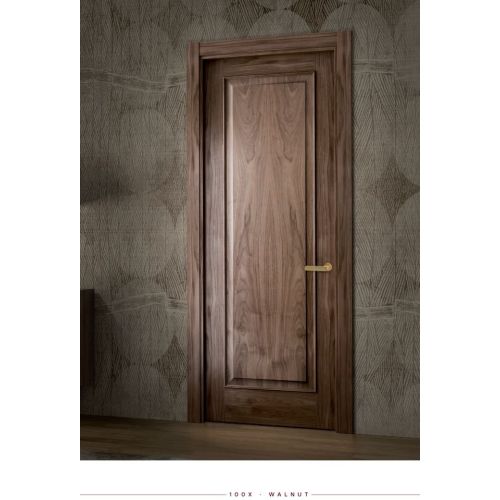 Classic collection door model 100X in Walnut with Fresh handle in Satin Brass.