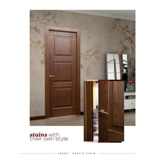 Classic collection door model 3300X in Rustic Stain with Arco handle in Satin Brass.
