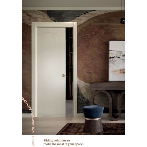 Live collection internal sliding door model 9019 in Dakota with ROUND privacy lock in Satin Brass.