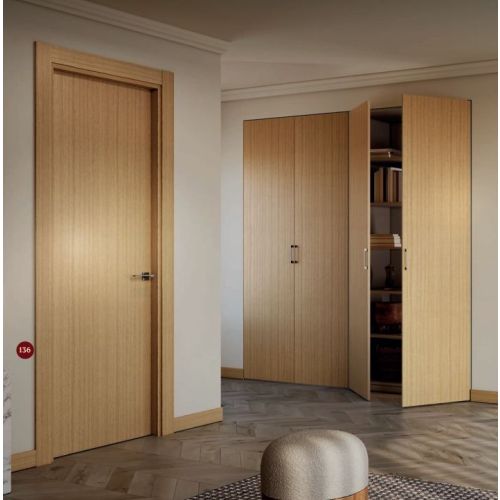 Minimal collection door model L50 in Rift Cut Oak with Plica handle in Graphite.